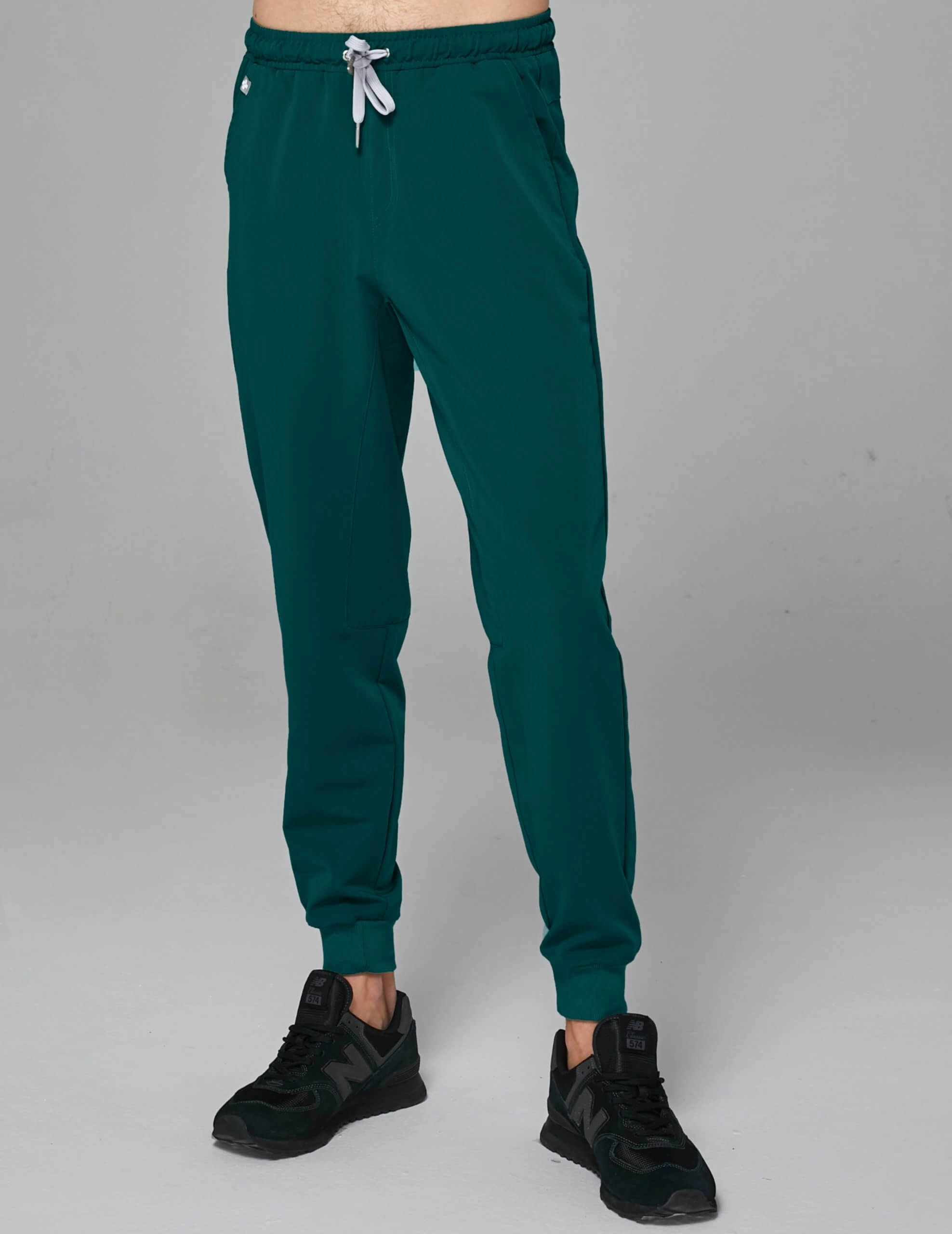 OUTLET Pánske nohavice Joggers - DEEP GREEN